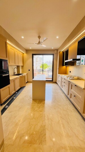 Kitchen in 4 BHK Builder Floor at Ansal API Versalia, Sector 67a – for Sale