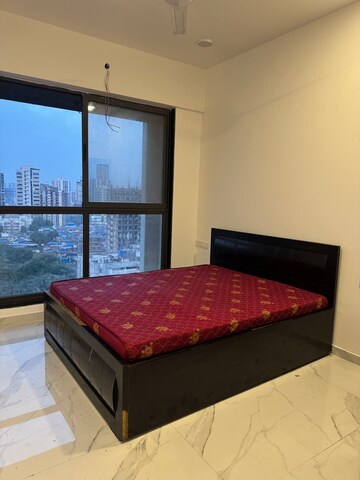 Bedroom in 2 BHK Apartment at Dev Leo Tower, Oshiwara – for Rent