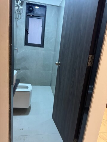 Bathroom in 2 BHK Apartment at Dev Leo Tower, Oshiwara – for Rent