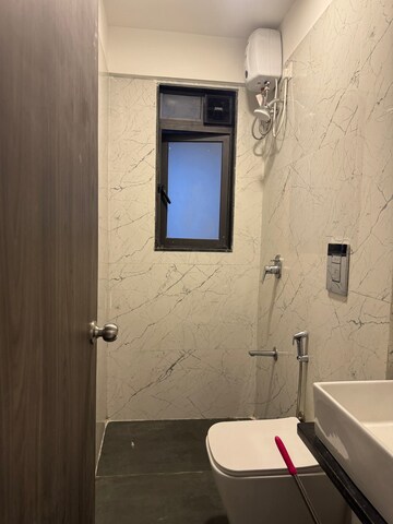 Bathroom in 2 BHK Apartment at Dev Leo Tower, Oshiwara – for Rent