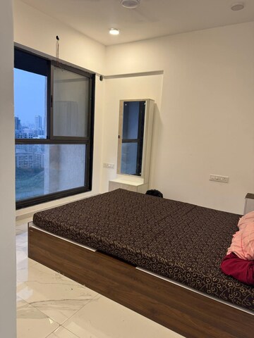 Bedroom in 2 BHK Apartment at Dev Leo Tower, Oshiwara – for Rent