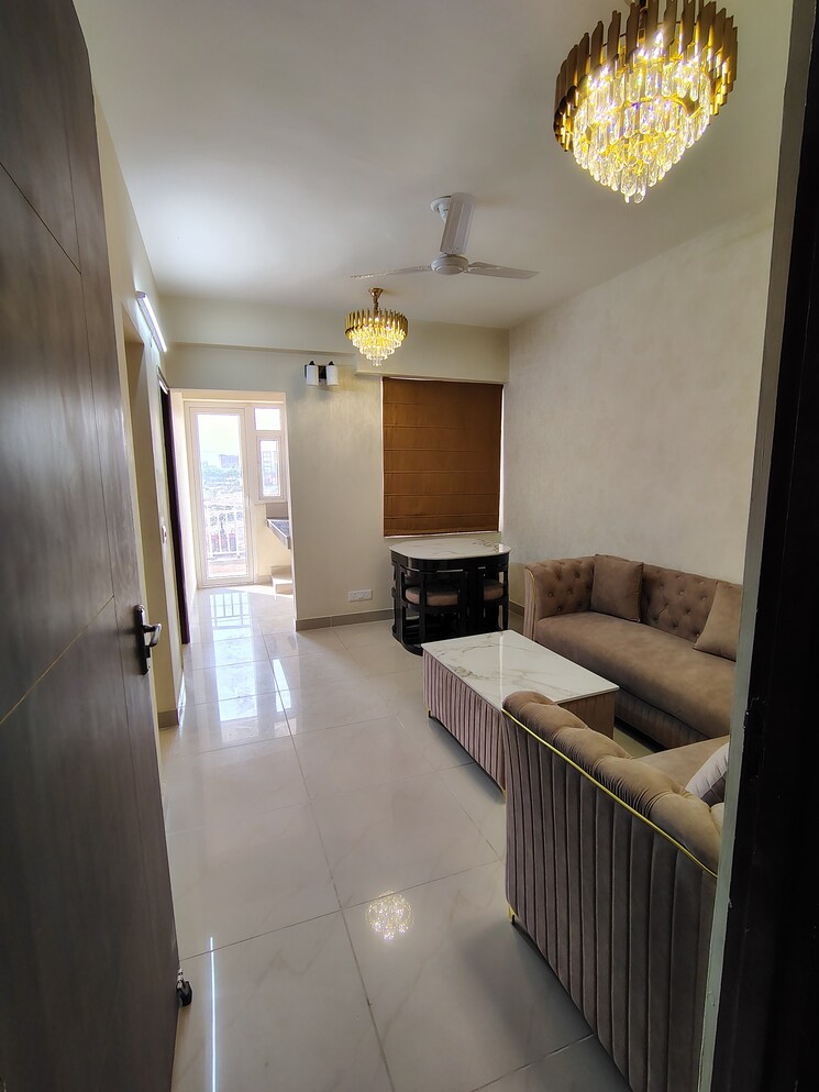 Living Room, aditya-world-city 2 Bedroom 858 Sq.Ft. Apartment In Shahpur Bamheta Ghaziabad 8841269
