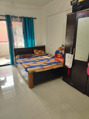 Bedroom in 2 BHK Apartment at Mittal Atria, Dhanori – for Rent