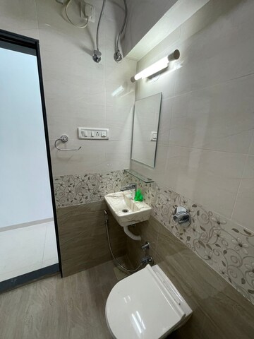 Bathroom in 3 BHK Apartment at Interintel Gurnani Palms, Amboli – for Rent