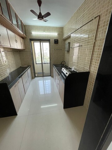 Kitchen in 3 BHK Apartment at Interintel Gurnani Palms, Amboli – for Rent
