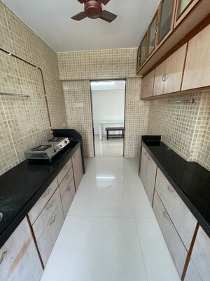 Kitchen in 3 BHK Apartment at Interintel Gurnani Palms, Amboli – for Rent