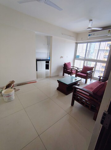 Living Room in 1 BHK Apartment at Godrej Tranquil, Kandivali East – for Rent