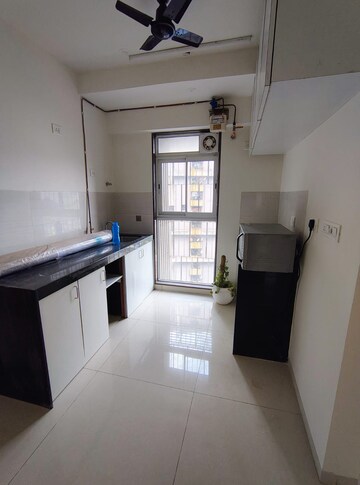 Kitchen in 1 BHK Apartment at Godrej Tranquil, Kandivali East – for Rent