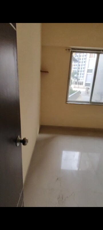 Room in 2 BHK Apartment at Kamdhenu Gardenia, Taloja – for Rent