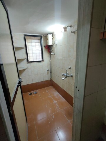 Bathroom in 1 BHK Apartment at Jeevan Saukhya, Kandivali West – for Rent