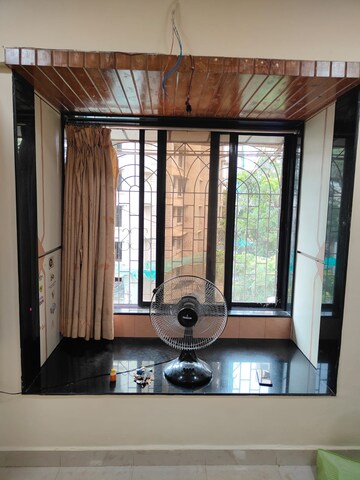 Living Room in 1 BHK Apartment at Jeevan Saukhya, Kandivali West – for Rent