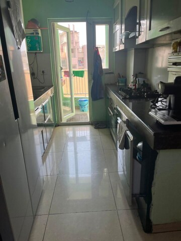 Kitchen in 3 BHK Apartment at Ajnara Daffodil, Sector 137 – for Rent