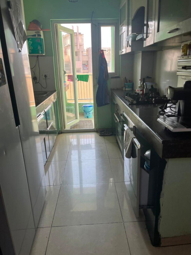 Kitchen, ajnara-daffodil 3 Bedroom 1248 Sq.Ft. Apartment In Sector 137 Noida 8841765