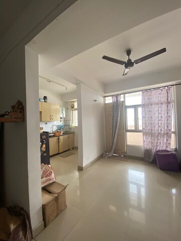 Living Room in 2 BHK Apartment at Aims Golf City, Sector 75 – for Rent