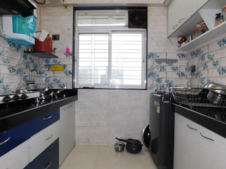 Kitchen, guinea-global-new-murli-malhar-chs 3 Bedroom 724 Sq.Ft. Apartment In Mulund West Mumbai 8842069