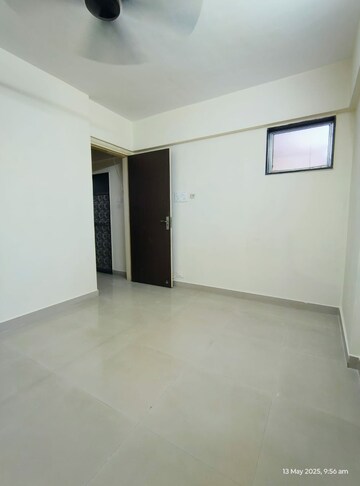 Room in 3 BHK Apartment at Guinea Global New Murli Malhar CHS, Mulund West – for Sale