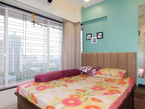 Bedroom in 3 BHK Apartment at Guinea Global New Murli Malhar CHS, Mulund West – for Sale
