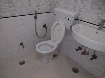 Bathroom in 2 BHK Apartment at Gaurs Green Vista, Nyay Khand – for Rent