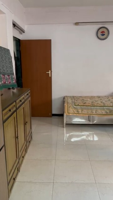 Bedroom in 2 BHK Apartment at New Malini CHS, Andheri East – for Rent