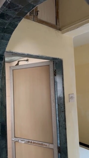 Building Lobby in 2 BHK Apartment at New Malini CHS, Andheri East – for Rent