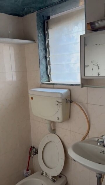 Bathroom in 2 BHK Apartment at New Malini CHS, Andheri East – for Rent