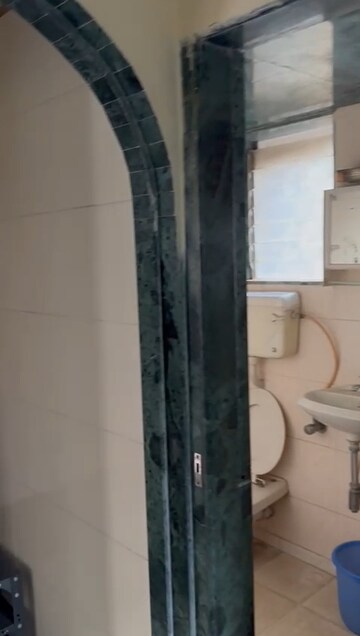 Bathroom in 2 BHK Apartment at New Malini CHS, Andheri East – for Rent