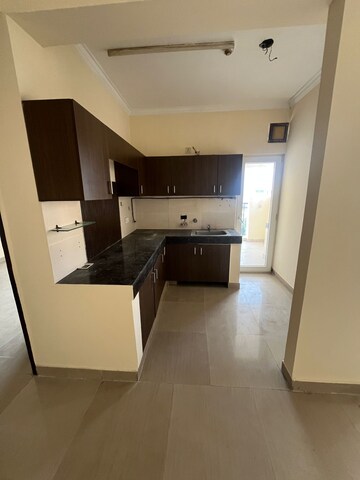 Kitchen in 2 BHK Apartment at Paramount Floraville, Sector 137 – for Rent