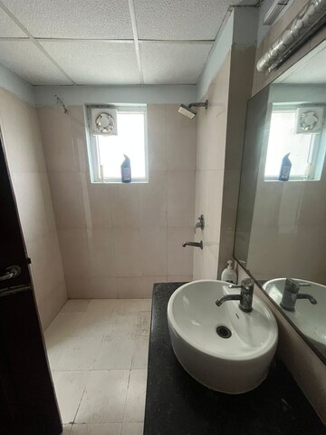Bathroom in 2 BHK Apartment at Paramount Floraville, Sector 137 – for Rent