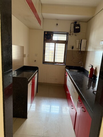 Kitchen in 2 BHK Apartment at Piramal Vaikunth, Balkum Pada – for Rent