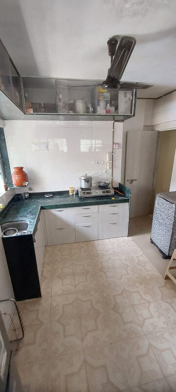 Kitchen in 1 BHK Apartment at Lalani Grandeur, Goregaon East – for Rent