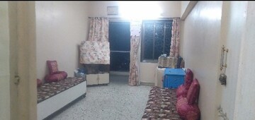 Living Room in 1 BHK Apartment at Takshila CHS, Andheri East – for Sale