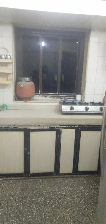 Kitchen in 1 BHK Apartment at Takshila CHS, Andheri East – for Sale