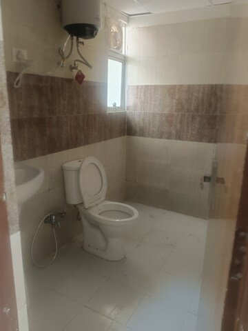 Bathroom in 3 BHK Apartment at Gulshan Bellina, Sector 16 Greater Noida – for Rent