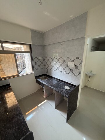 Kitchen in 1 BHK Apartment at Ekdant Dinkar Elite, Kalyan East – for Sale