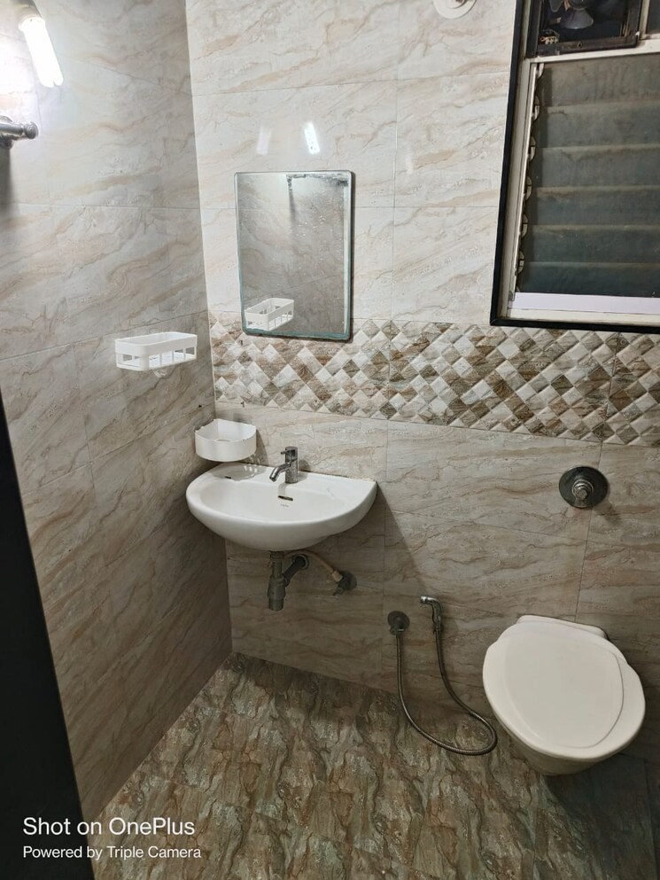 Bathroom, nirman-silver-mist 2 Bedroom 683 Sq.Ft. Apartment In Lohgaon Pune 8842947