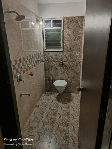 Bathroom in 2 BHK Apartment at Nirman Silver Mist, Lohgaon – for Rent