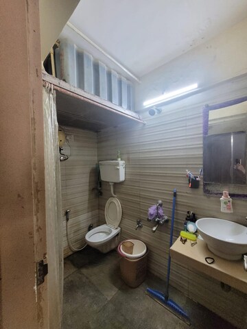 Bathroom in 3 BHK Apartment at Ravi Group Gaurav woods 2, Mira Road – for Rent