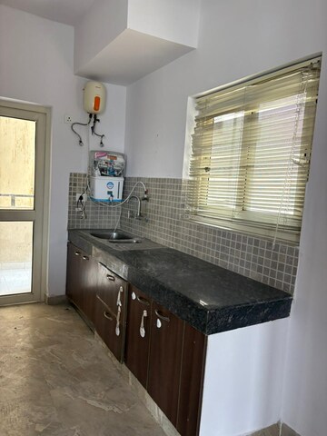 Kitchen in 3 BHK Apartment at Nimbus The Golden Palm, Sector 168 – for Rent
