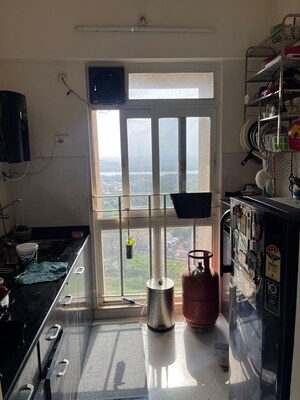 Kitchen in 1 BHK Apartment at Vijay Orovia, Ghodbunder Road – for Sale