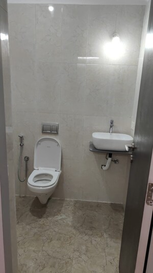 Bathroom in 4 BHK Apartment at Saraswati Vihar – for Sale