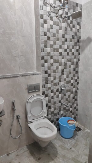 Bathroom in 4 BHK Apartment at Saraswati Vihar – for Sale