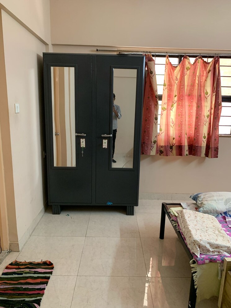 Bedroom, magarpatta-city-cosmos 2 Bedroom 990 Sq.Ft. Apartment In Magarpatta Road Pune 8843738