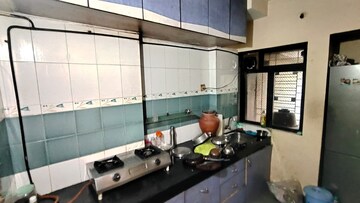 Kitchen in 1 BHK Apartment at Giriraj CHS Naupda, Naupada – for Rent