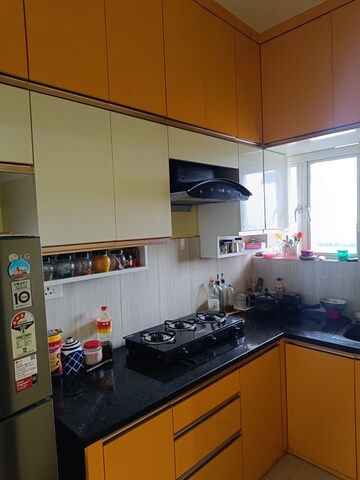 Kitchen in 2 BHK Apartment at Netaji Subhas Chandra Bose Road – for Sale