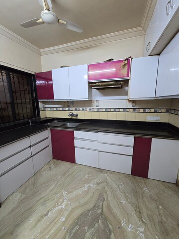 Kitchen in 3 BHK Apartment at Green Valley CHS, Wanwadi – for Rent