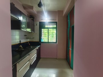 Kitchen in 1 BHK Apartment at Puranik City, Kasarvadavali – for Rent