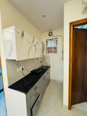Kitchen in 1 RK Builder Floor at Sushant Lok I – for Rent