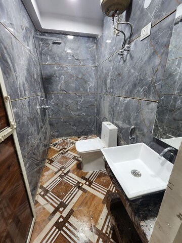 Bathroom in 4 BHK Apartment at Palam Vihar – for Rent