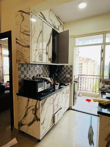 Kitchen in 2 BHK Apartment at Omkar Signet, Malad East – for Sale