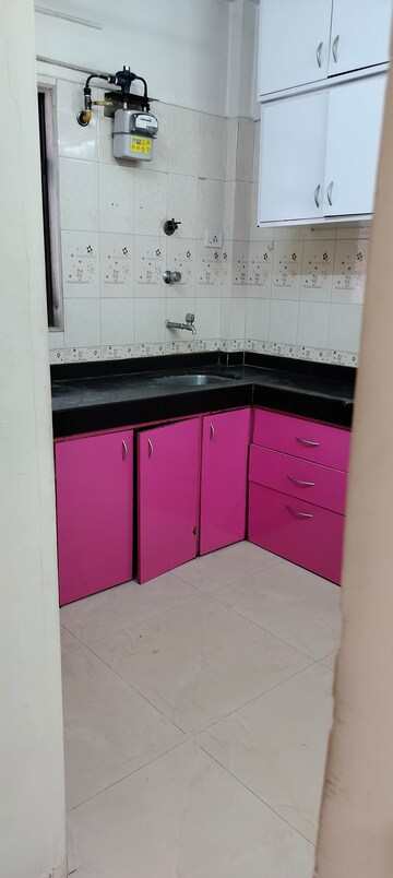 Kitchen in 1 BHK Apartment at Ashirwad Tower, Andheri West – for Rent